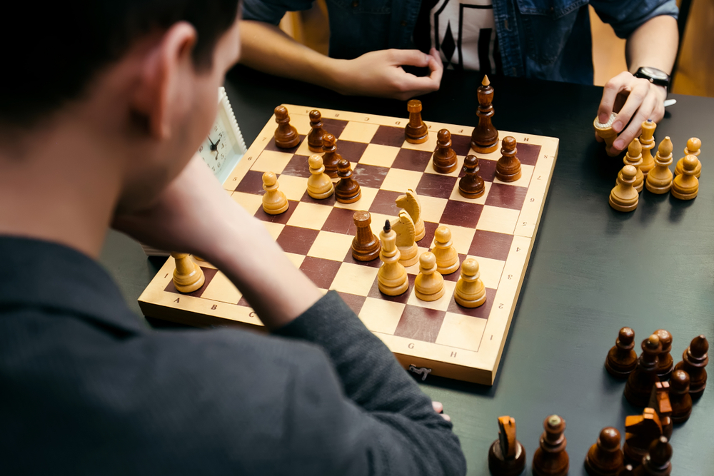 Pensive,Teenager,Play,Chess,During,Chess,Competition,In,Chess,Club,Brain function
