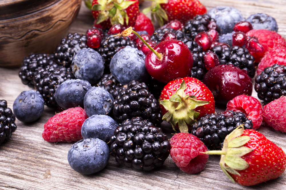 Tasty,Summer,Fruits,On,A,Wooden,Table.,Cherry,,Blue,Berries,