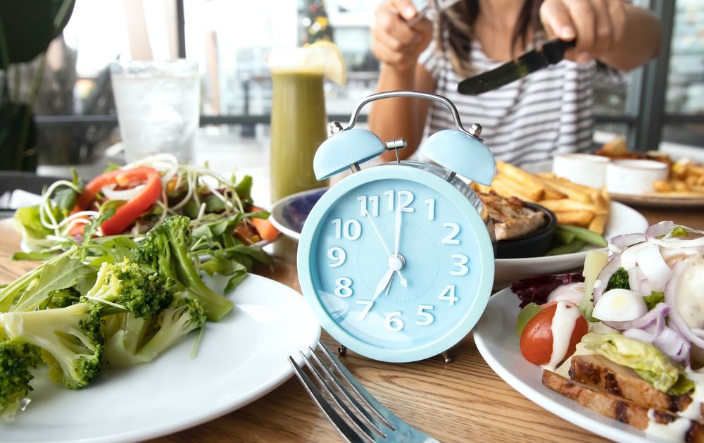 Selective,Focus,Of,Blue,Clock,And,Time,To,Lose,Weight,Intermittent Fasting,HealthHacks