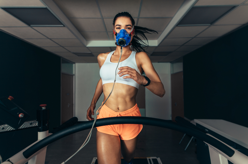 Vo2,Max,Test.,Sportswoman,With,Mask,Running,On,Treadmill.,Female