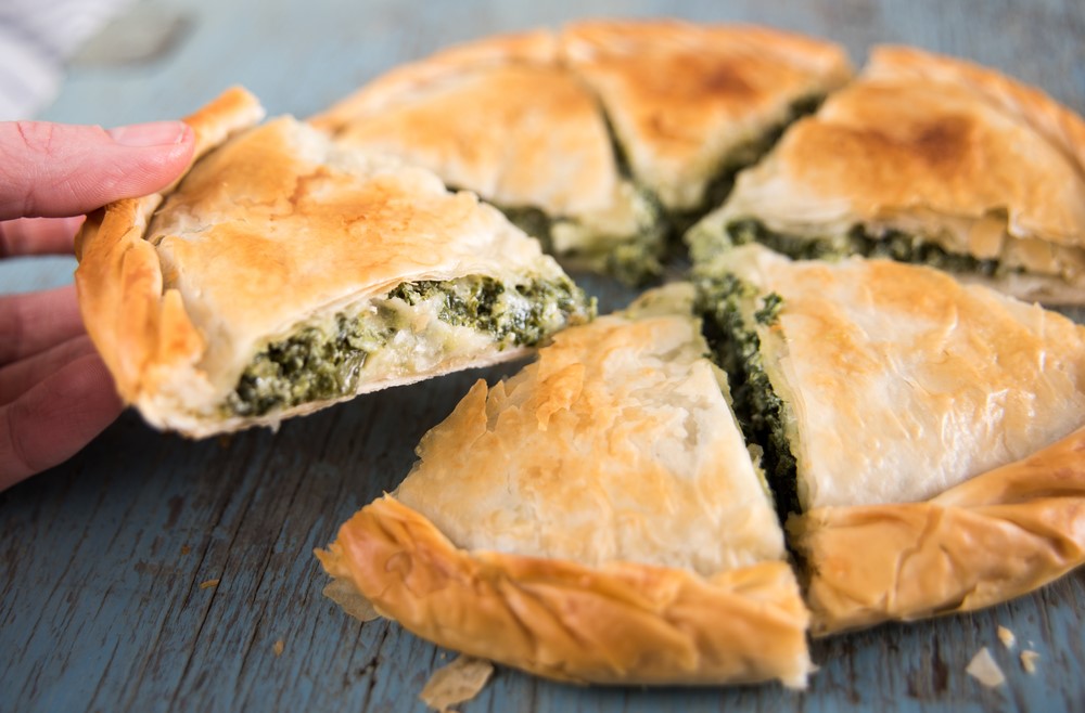 greek,spinach,feta,green,homemade,savory,snack,cooked,portion,cuisine,filo,dinner,pie,food,cheese,meal,triangles,rustic,spanakopita,pastry,traditional,healthy,appetizer,baked;